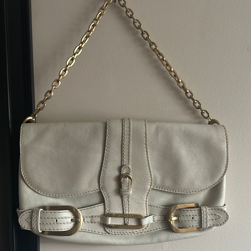 JIMMY CHOO Cream and Gold Clutch with Chain Strap and Decorative Buckles